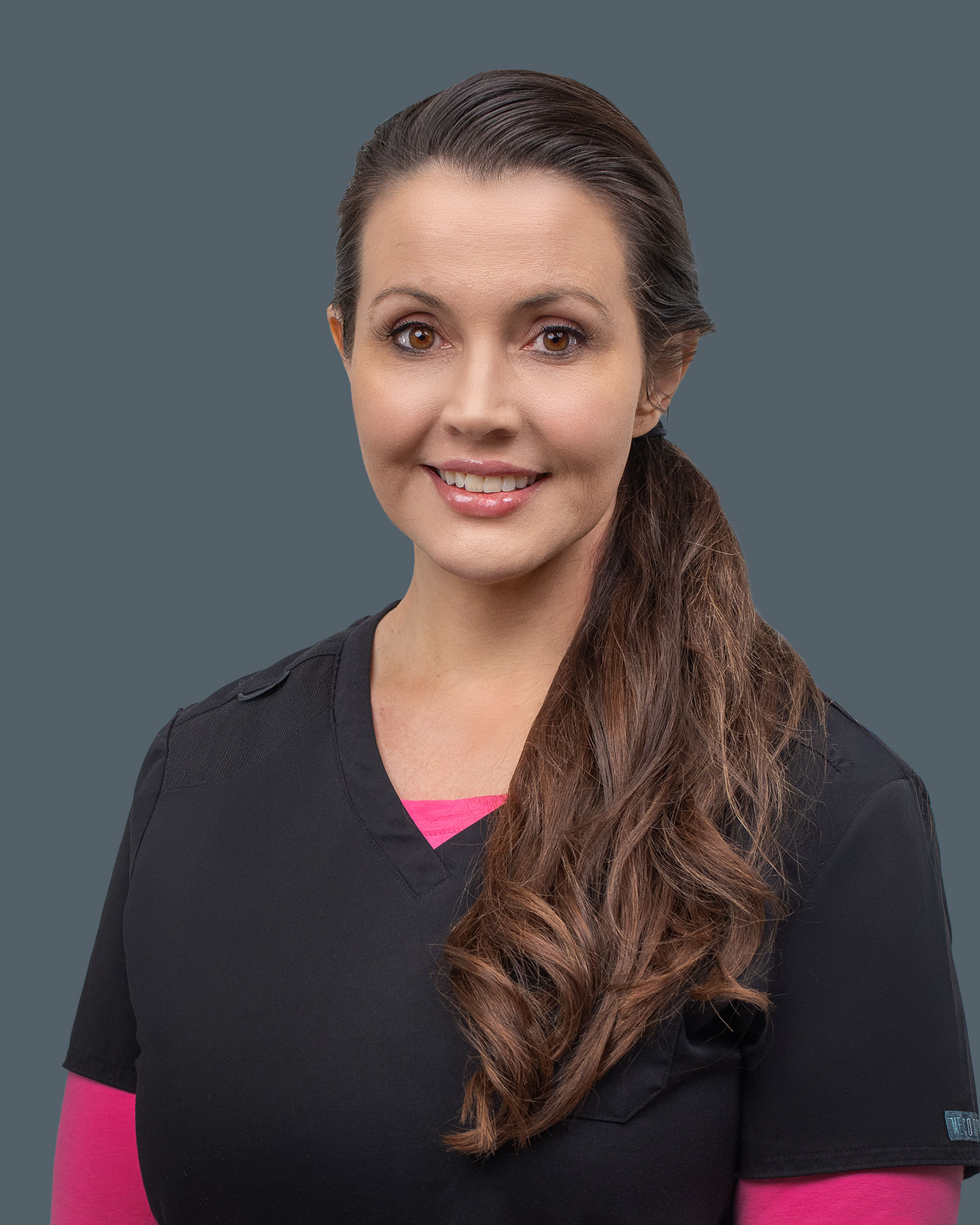 Headshot photo of Sharon Caravetta.